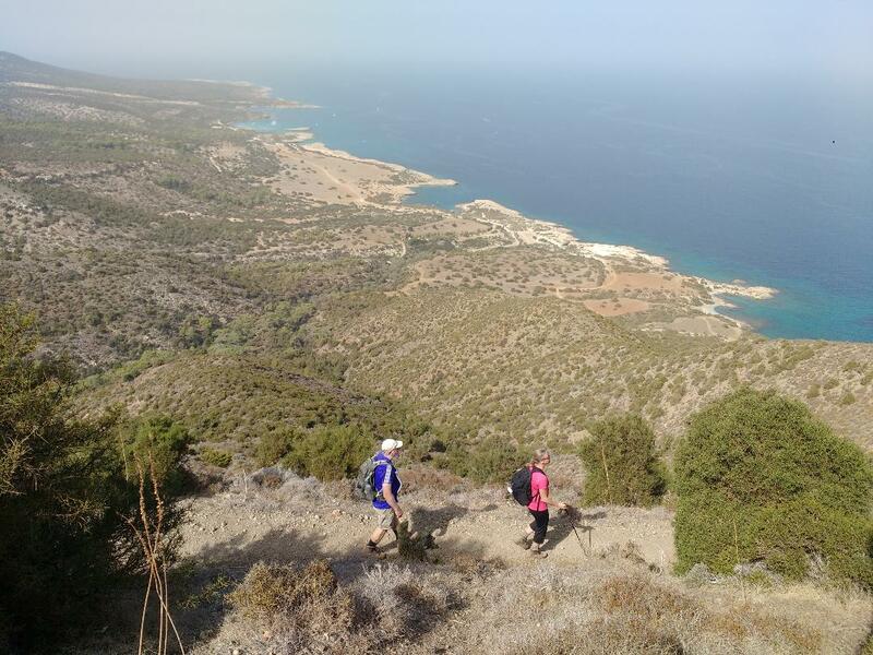 Two walkers descending Aphrodite trail